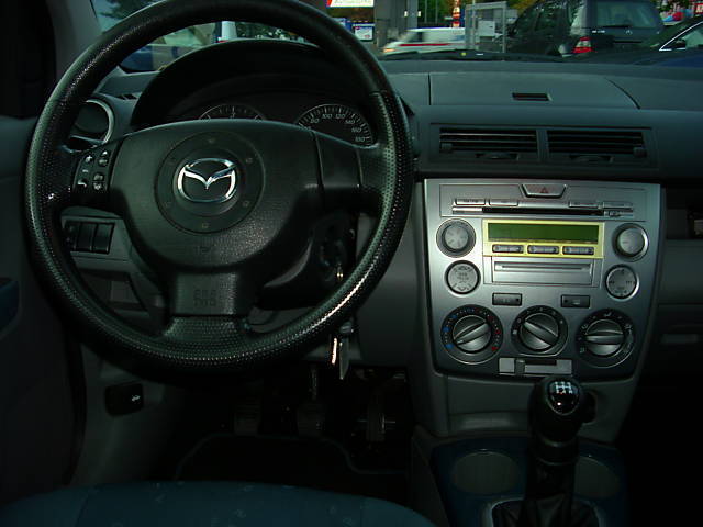 Mazda () 2 I (DY):  