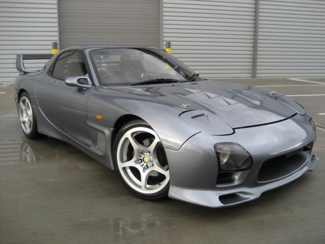 Mazda () RX-7 (FD3S):  