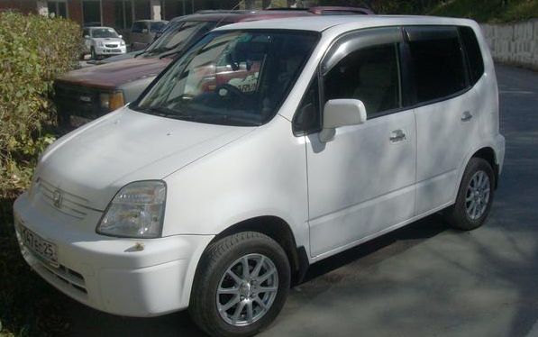 Honda () Capa:  