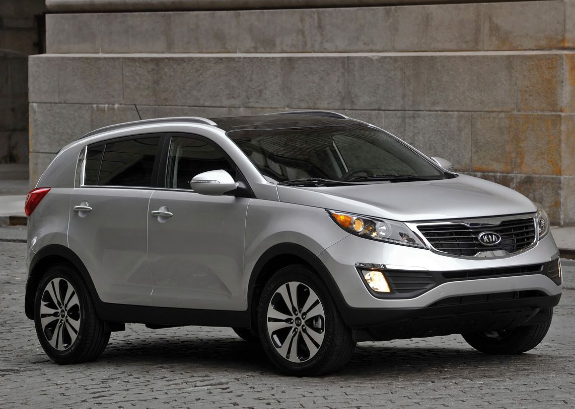 Kia () Sportage III (SL):  