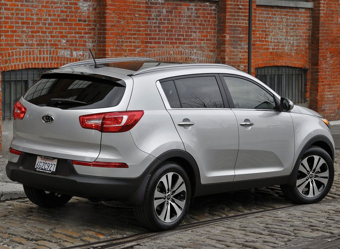 Kia () Sportage III (SL):  