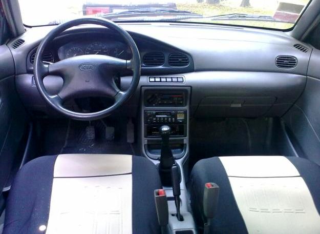 Kia () Avella:  