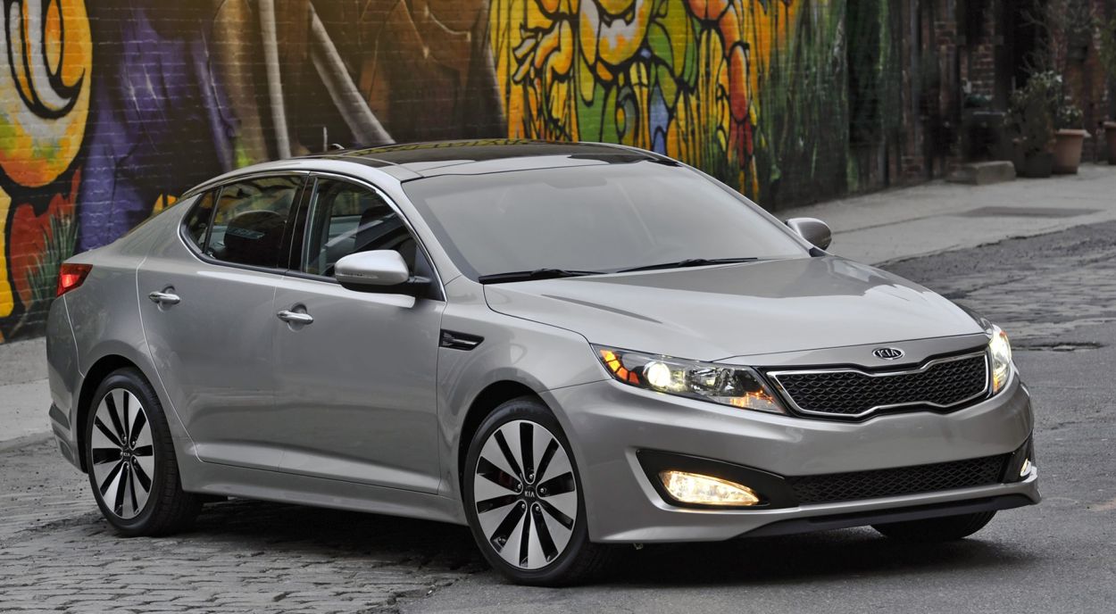 Kia () Optima III (TF):  