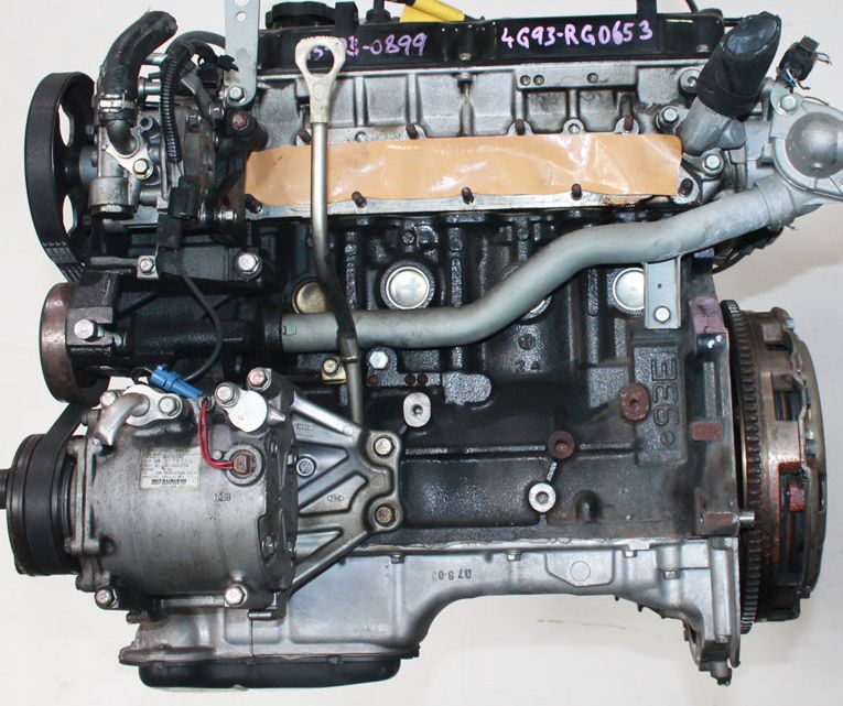 Номер двигателя mitsubishi. Двигатель Митсубиси 4g93. Мотор MPI 4g93. Двигатель 4g93 MPI. 4g93 1.8 MPI.