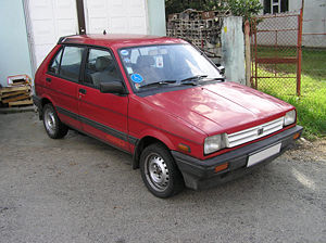 Subaru () Justy I (KAD):  