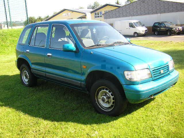 Kia () Sportage (K00):  