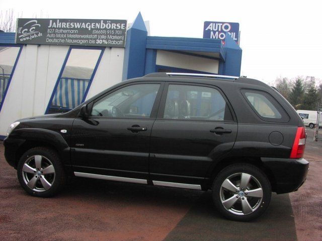 Kia () Sportage II (JE):  