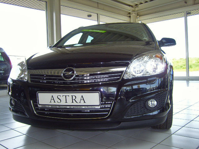Opel () Astra H caravan (L35):  